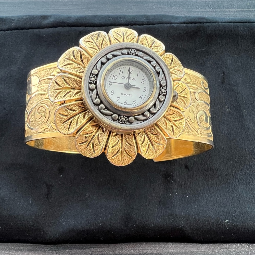 Three vintage watches and oversized earrings
